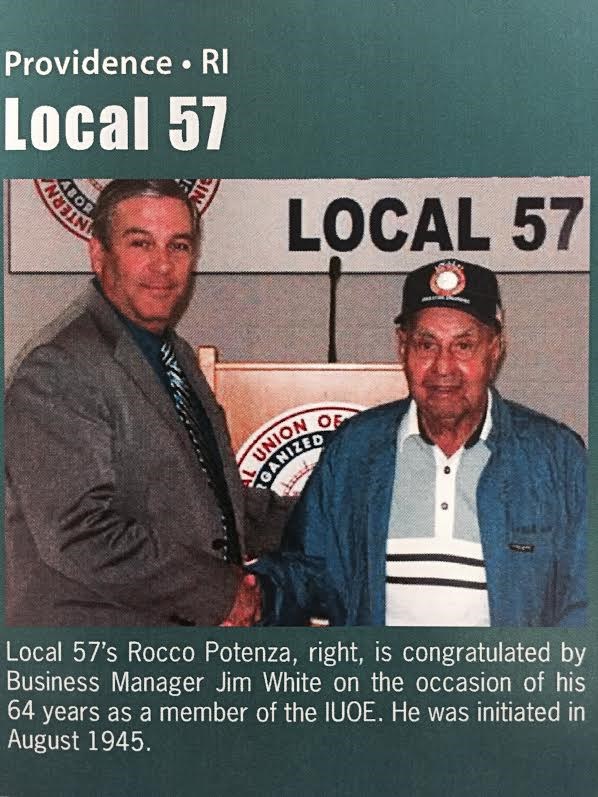 Local 57's Rocco Potenza, right, is congratulated by Business Manager Jim White on the occasion of his 64 years as a member of the IUOE.